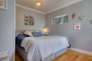 Bedroom One- click for photo gallery
